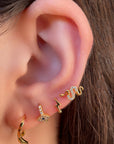 Tiny Snake Studs in Gold